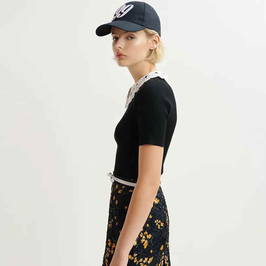 Essentiel Antwerp | HALAMO Black ribbed knitted polo top with removable lace collar - Collector Store