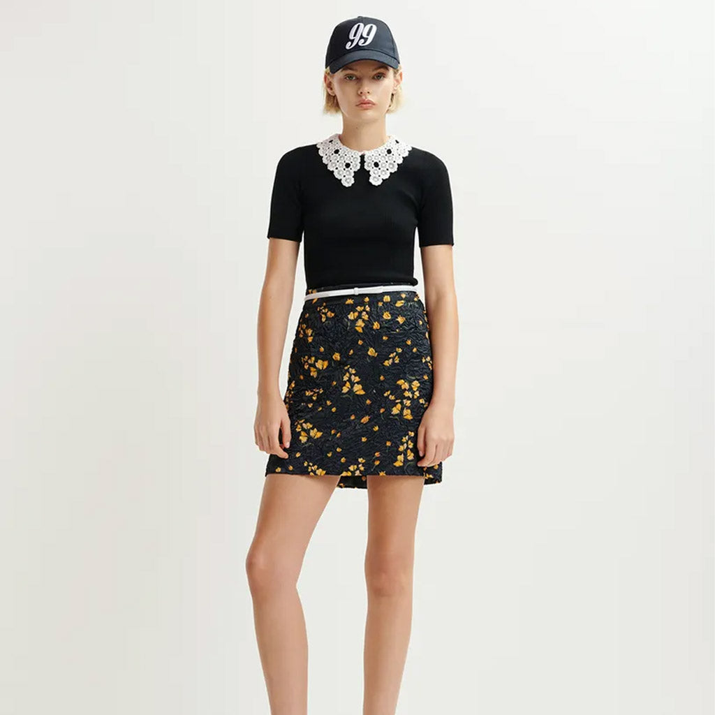 Essentiel Antwerp | HALAMO Black ribbed knitted polo top with removable lace collar - Collector Store